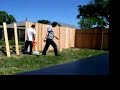 Jt and philly jeff building a fence