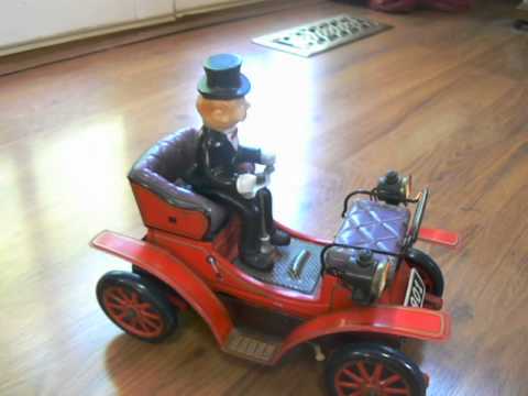 antique Toys 1950's - 1950s Gentleman 1901 Bump and Shake Driving Car Battery Operated Toy Japan.