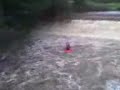Westhoughton CC paddlers do Burrs Weir in high water Westhoughton CC paddlers do Burrs Weir in high water