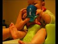Baby Natalie learning to drink from a cup