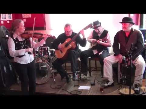EclectiX1 - Choro Bandido at The Star, Dorking, for OXJAM 2012 Ali - Violin Dave - Cavaquinho Brian - 7 string Guitar Mick - Pandeiro http://www.chorobandido.co.uk.