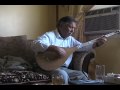 Ustad Shah Ewaz is playing Dambura and sings high poems of famous Dari poets.