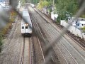 2 trains meet at Ossining NY, seen from the bridge north of the station