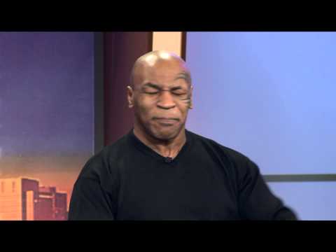 Mike Tyson Re-enacts Biting Off The Ear on WGN Morning News Video