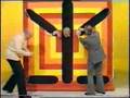 David Nixon stretches John Inman
