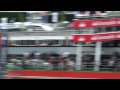 Raikonnen overtakes Toyota in pit lane.