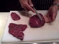 Chris Cosentino cleaning a beef heart