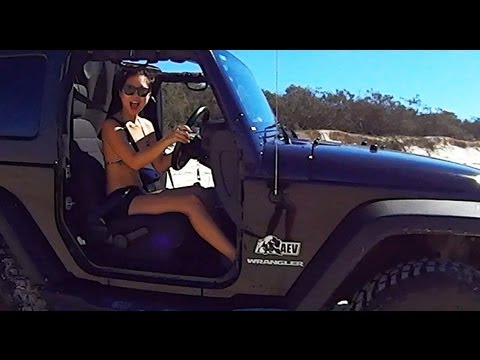 Jeep Wrangler JK on the beach, 4x4 and camping