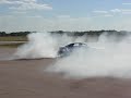 Infiniti Q45 burning rubber doing donuts pt. 1