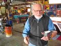 Bill Riedel shows how to fold a paint cup from an index card