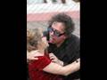 Tim Burton and Helena Bonham Carter kissing