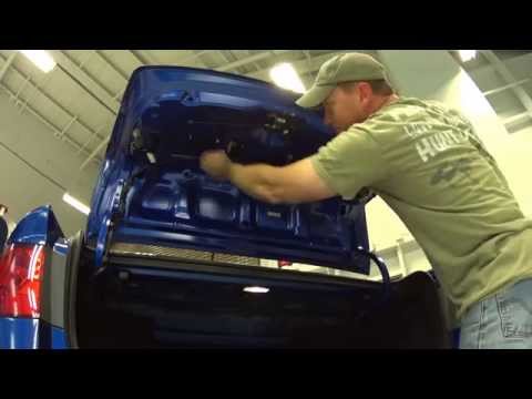 How to replace the license plate light on a 2010 Kia Forte Sedan