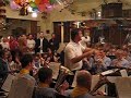 Dave Trickett conducting the Scout Band at Bacup GC  Xmas05