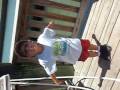 Young boy catches 2 fish.