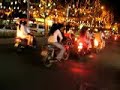 the saigon streets sparkled with lights as never before last christmas! this view is taken from ben's bike. we were trying to find a parking space to do our shopping at tax centre