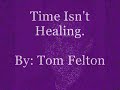 a slide show of tom felton, with him singing time isn't healing.