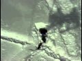 Video: Snowboarder ski lift face plant