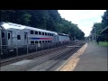 After getting off at Ho-Ho-Kus I start railfanning. First: Metro-North F40PH-3C #4907 arrives with 5 Comet V coaches going to Waldwick. Metro-North Comet V #6713 is trailing. Second: NJ Transit GP40PH-2 #4107 leads 3 NJ Transit Comet V coaches that only went to Ridgewood is now going to Waldwick to turn around and go back on a later train. Third: NJ Transit Multilevel Cab Car #7018 arrives going to Hoboken. PL42AC #4011 is pushing with Cab Car #7037 in front of it. Fourth: Metro-North GP40FH-2 #4902 leads an express train of 7 Metro-North Comet V's to Port Jervis. Comet V #6710 is trailing. Fifth: NJ Transit GP40FH-2 #4138 leads a train of 5 Comet V's going to Suffern. Comet V Cab #6006 is trailing. Sixth: NJ Transit Comet V #6027 with GP40PH-2 #4101 is now deadheading back to Hoboken for another run. This is the same train that brought me here from Secaucus. Seventh: Metro-North Comet V #6710 with F40PH-3C #4907 is also deadheading back to Hoboken right behind the NJ Transit set. As soon as #4907 goes around the curve Metro-North GP40PH-2 #4906 is leading an express train of 5 Metro-North Comet V's to Port Jervis. That ends part 1! Thumbs Up, Comment, and Subscribe!