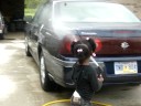 lil girl washing a car for the first time