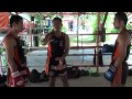 Tiger Muay Thai Techniques: body kick in response to opponents cross punch attack
