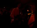 the texas sluts in a small bar playing one of their original songs
