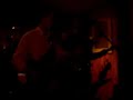 the texas sluts in a small bar playing one of their original songs