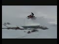 Backflip attempt jumping road with snowmobile