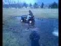 my tractor goin through some deep water with ease