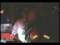 Quest plays Reggae while a topless girl dances in the DJ Booth