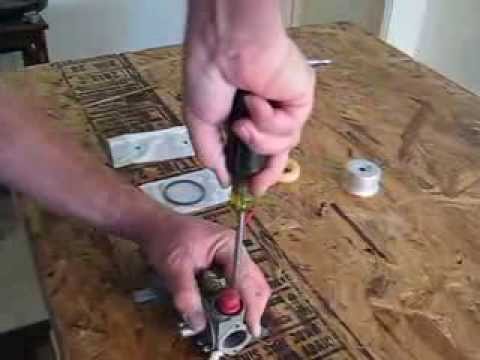 how to rebuild a lawn mower carburetor