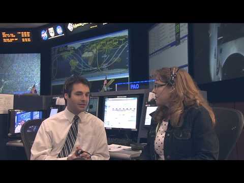 the station - Brandi Dean interviews SPARTAN flight controller Anthony Vareha. The SPARTAN console in the Mission Control Center is in charge of the station's electrical a...