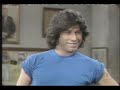 John Travolta sings