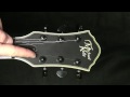Changing guitar strings on an electric guitar