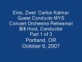 bill hunt, conductor of the portland (or) metro youth symphony concert orchestra, hands the baton to guest conductor carlos kalmar, conductor and music director of the oregon symphony
