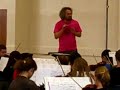 bill hunt, conductor of the portland (or) metro youth symphony concert orchestra, hands the baton to guest conductor carlos kalmar, conductor and music director of the oregon symphony