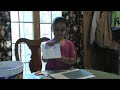 Gia Stamps a Card