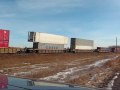 CP Rail stack train arriving in Shepard - Calgary, Alberta with GMD SD40-2 #5904 and GMD SD40-2F #9007 leading.