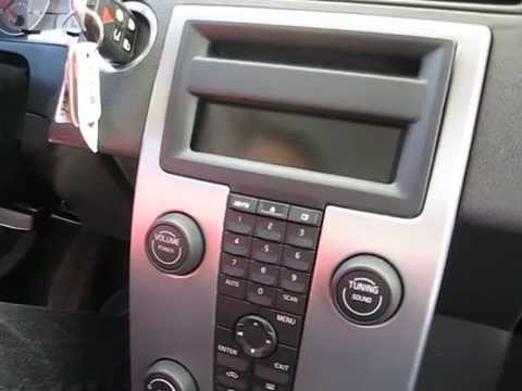 How to remove Radio / CD Changer / from Volvo S40 2006 for repair.