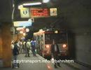 Kerb guided trolleybus & tram in tunnel & stn.