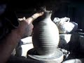 SIMON LEACH- throwing a wine flagon