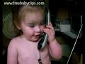 Little Girl Pretends to Talk to Daddy on Telephone
