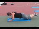 Patty does Kettlebell Swings, Jumping Pull Ups, Push Ups, and Squats