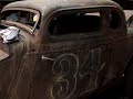this is a 1934 sedan converted through some custom restyling into a 34 coupe. The metal work is flawless, so much in fact that we kept the original 4 door door handles to show that it was in fact a sedan.