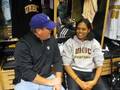 Drew chats with UMBC women's assistant Billi Godsey