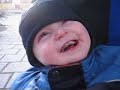 Roll-eating kid laughing at the word 
