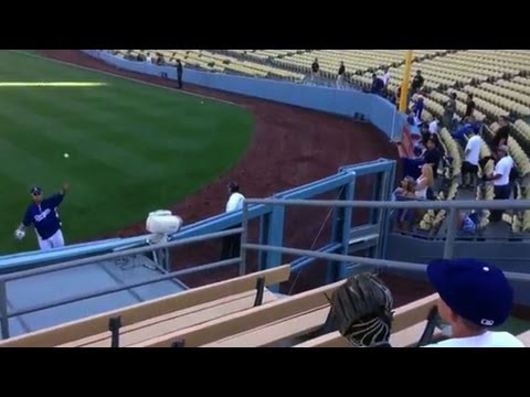 Ryu has a pregame toss with a fan in the bleachers_MLB Baseball, Major League Baseball. MLB's best of the week
