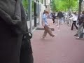 kid dancing outside the anne frank house