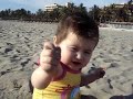 Mia playing with sand