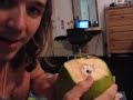 We just opened our first coconut. This was the least helpful video, but most amusing. http://tr.im/EoyU