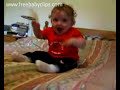 Baby enjoys tickling game